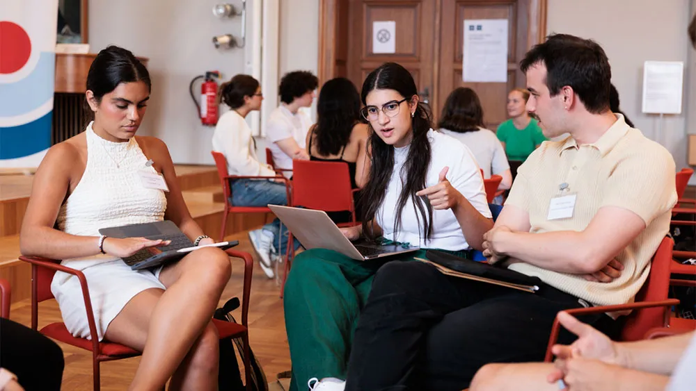 Three students working together