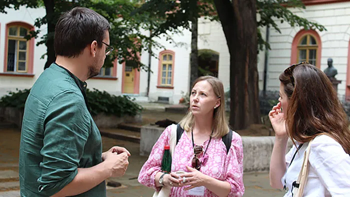 Three people talking