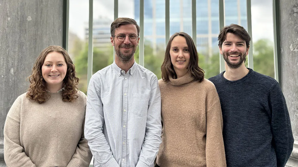 Four people smiling: Audrey, Kevin, Margo and Giacomo