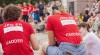 Two "buddies" at the University of Oslo in red t-shirts